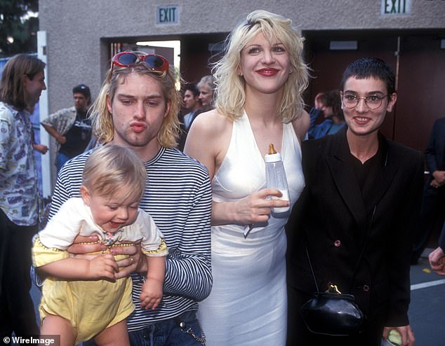 Courtney Love and Kurt Cobain pictured in 1993 with their young baby, Frances Bean