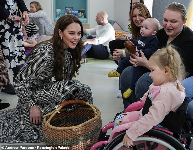 The princess¿ Centre for Early Years at Kensington Palace say these projects combined have a potential reach of more than half a million babies and young children. Above, Catherine during a visit toa children's hospice based in Sully, near Cardiff