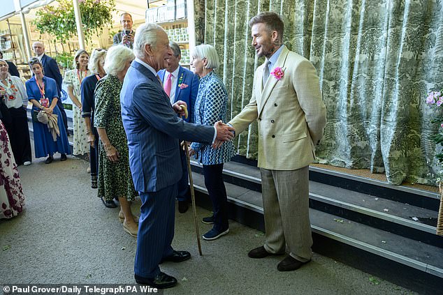 King Charles III, Patron of The Royal Horticultural Society, meets David Beckham during a visit to the RHS Chelsea Flower Show