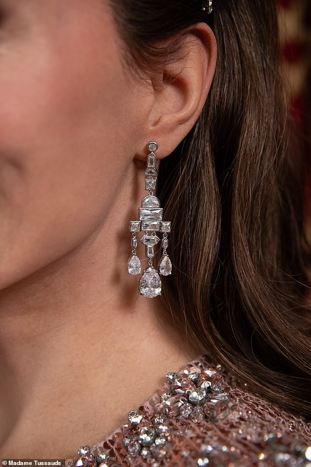 Her Greville diamond chandelier earrings meanwhile previously belonged to the late Queen Elizabeth