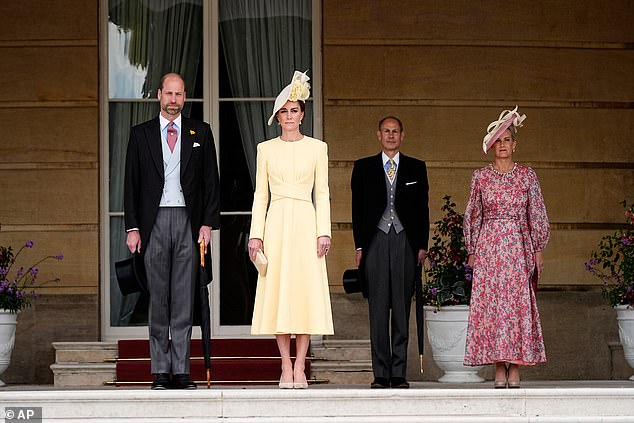 William and Kate (pictured today at the start of a Royal Garden Party at Buckingham Palace) were recognised for their efforts in addressing homelessness and early years development in children