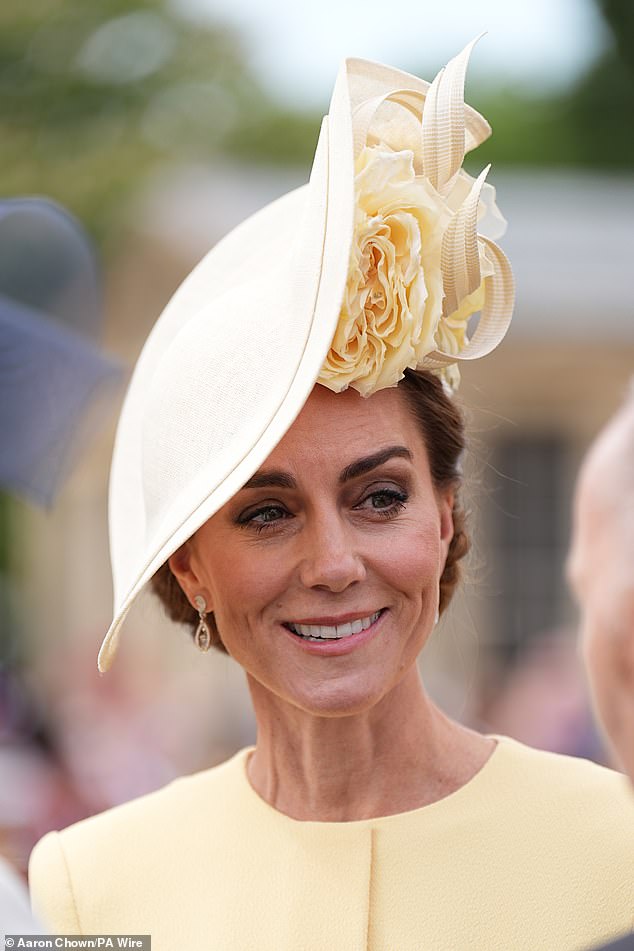 Kate, 43, rewore her yellow dress by Emilia Wickstead and a hat by Phillip Treacy
