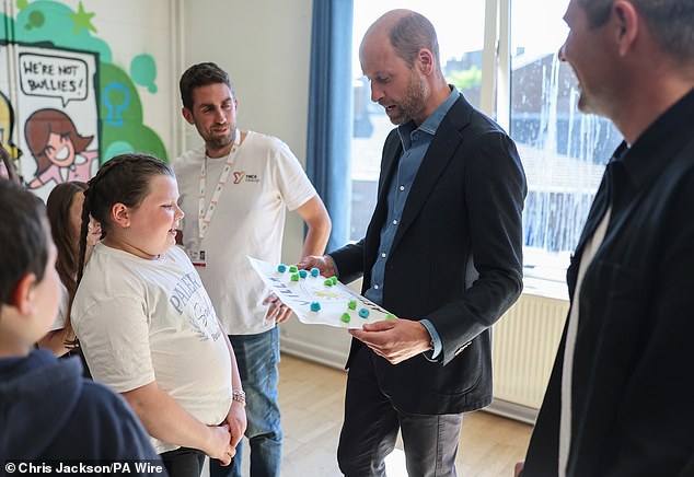 The Prince of Wales explained that Prince Louis, seven, is currently picking between 'five different teams'