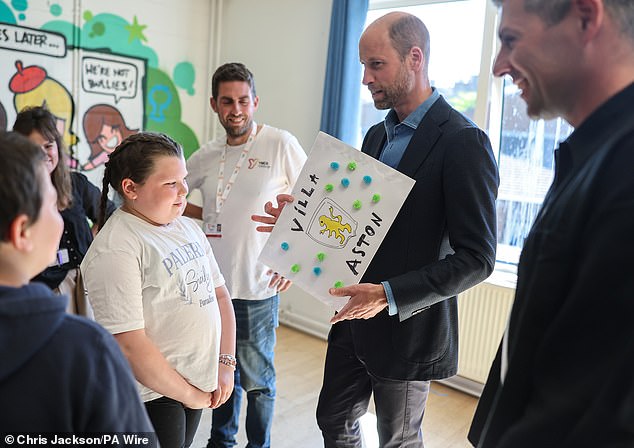 William met Erin, nine, who gifted him artwork of his beloved team, Aston Villa