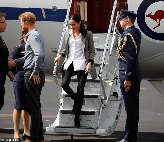 Prince Harry and his wife Meghan, Duchess of Sussex, arrive at Dubbo airport, Dubbo, Australia October 17, 2018