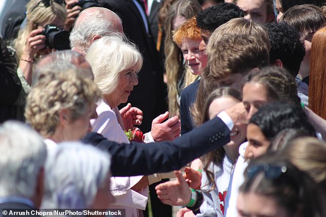 Camilla wore a pale pink coat to mark the special occasion in Canada yesterday