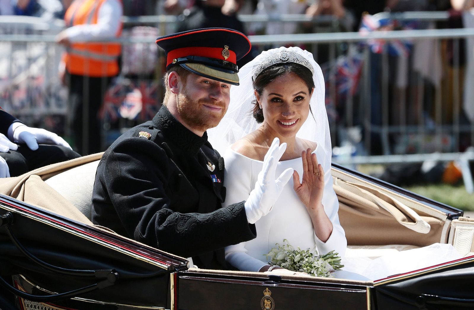 Image may contain Meghan Duchess of Sussex Prince Harry Duke of Sussex Clothing Glove Person Hat Adult and Wedding