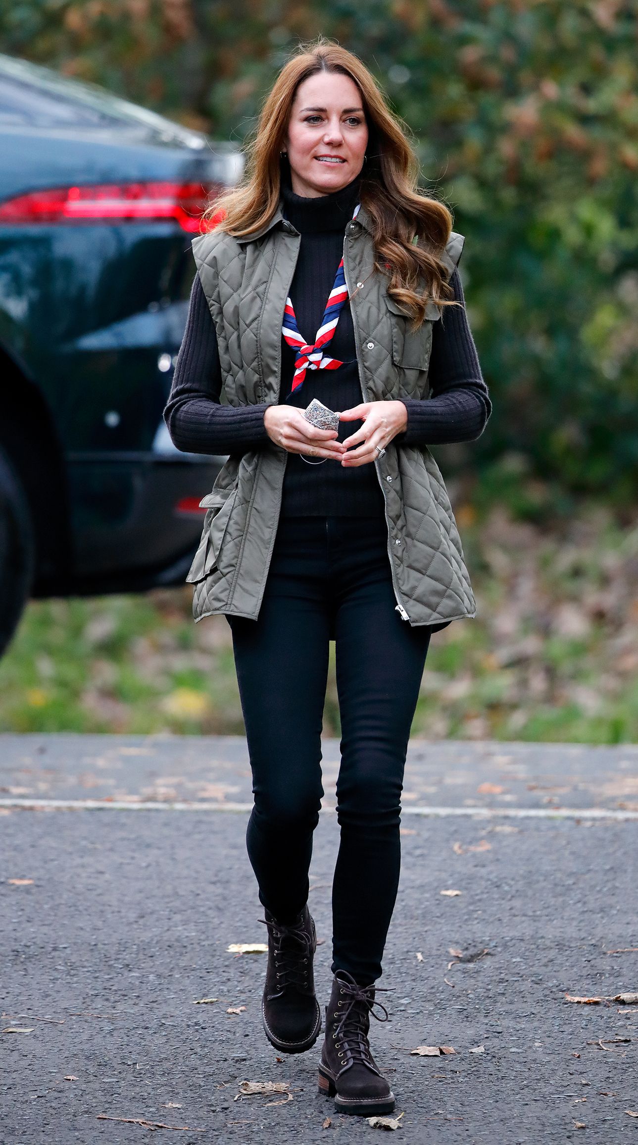 Image may contain Clothing Pants Coat Jacket Blazer Adult Person Jeans Car Transportation Vehicle and Footwear