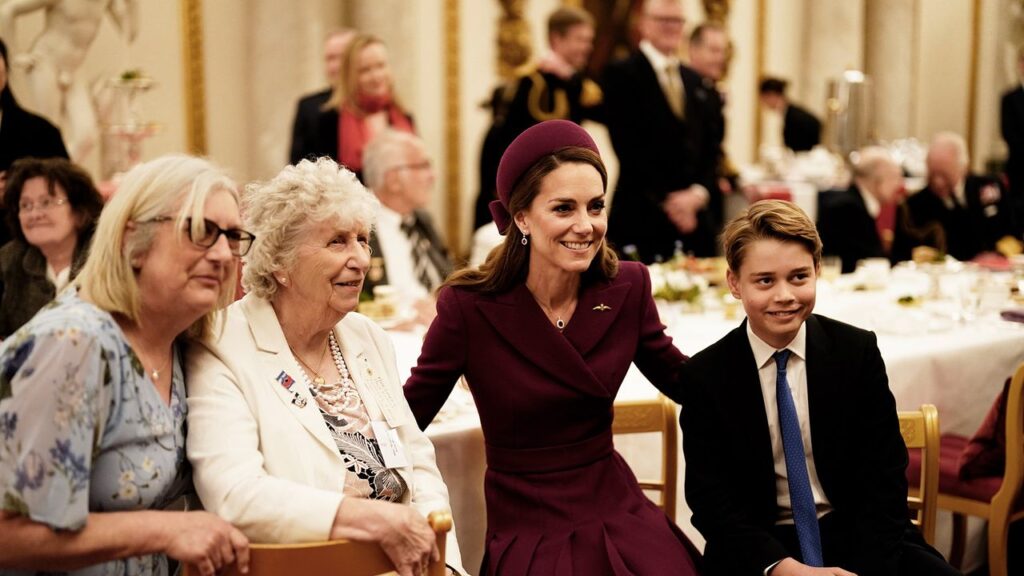 A king-in-training: Prince George unexpectedly joins Prince William and the Princess of Wales to meet veterans at a Buckingham Palace VE tea party