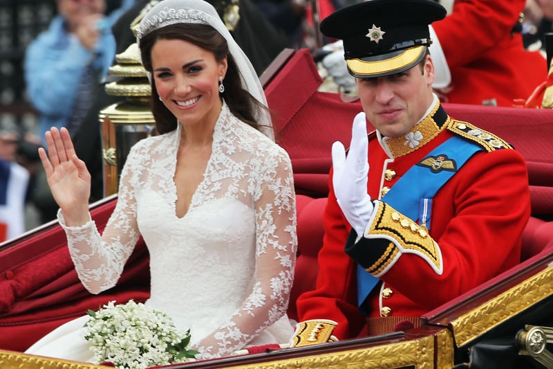 Their Royal Highnesses Prince William, Duke of Cambridge and Catherine, Duchess of Cambridge journey by carriage procession to Buckingham Palace following their marriage at Westminster Abbey on April 29, 2011 in London
