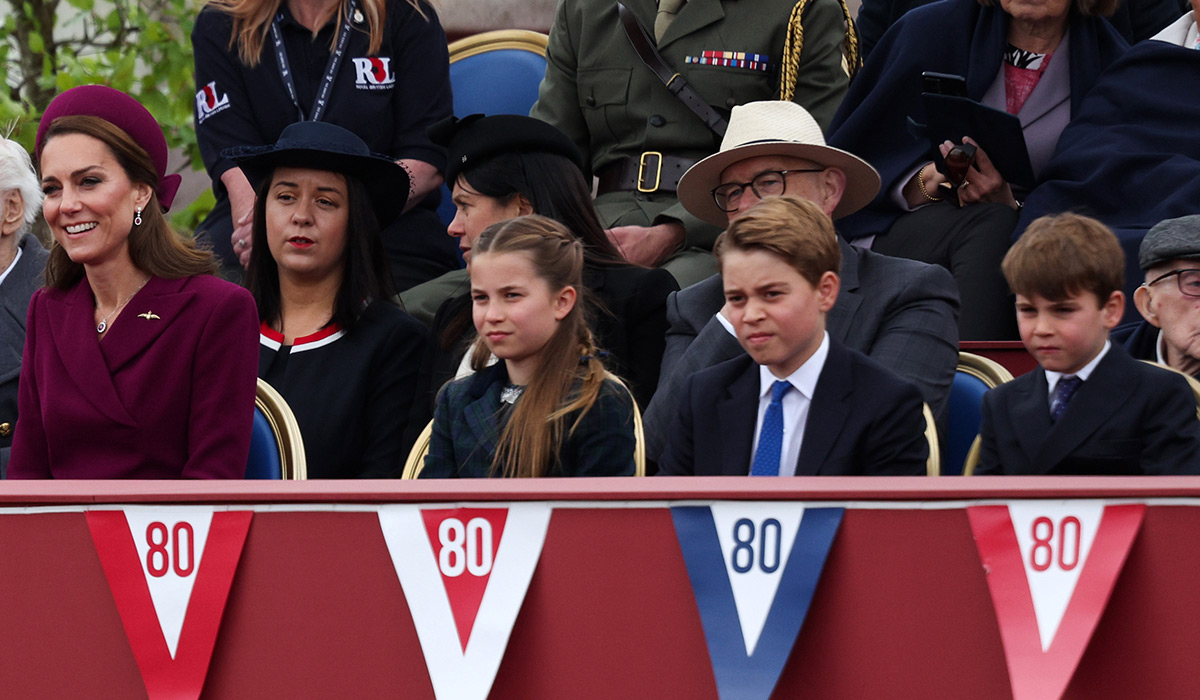 Catherine, Princess of Wales, Princess Charlotte, Prince George and Prince Louis watch the military procession for the 80th anniversary of VE Day. Pic: Getty Images