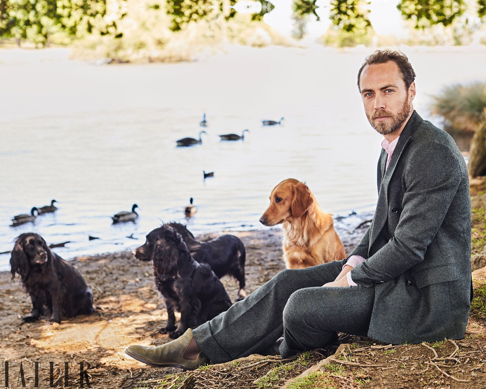 Image may contain James Middleton Person Sitting Adult Animal Canine Dog Mammal Pet Photography and Clothing