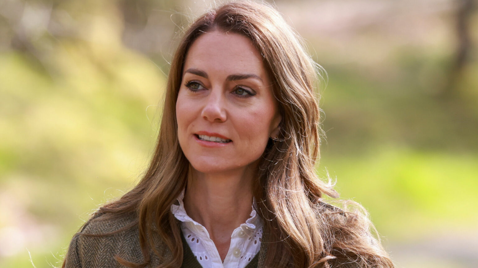 Kate Middleton Takes a High-Low Forest Walk in $70 Skinny Cargos and a $2,700 Ralph Lauren Jacket Kate Middleton wearing a green jacket with a green sweater and white shirt underneath