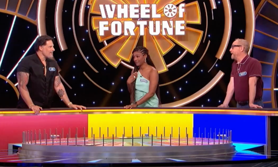 Joe, Tiffany Haddish, and Matt Walsh competing on Wheel of Fortune.