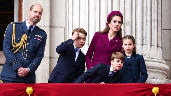 Britain's Prince William, Prince of Wales, Britain's Prince George of Wales, Britain's Prince Louis of Wales, Britain's Catherine, Princess of Wales and Britain's Princess Charlotte of Wales watch the flypast from Buckingham Palace balcony after attending the armed forces procession on May 5, 2025 to celebrate the 80th anniversary of VE Day also known as Victory in Europe Day, marking the end of the Second World War in Europe. (Photo by HENRY NICHOLLS / AFP)(AFP)