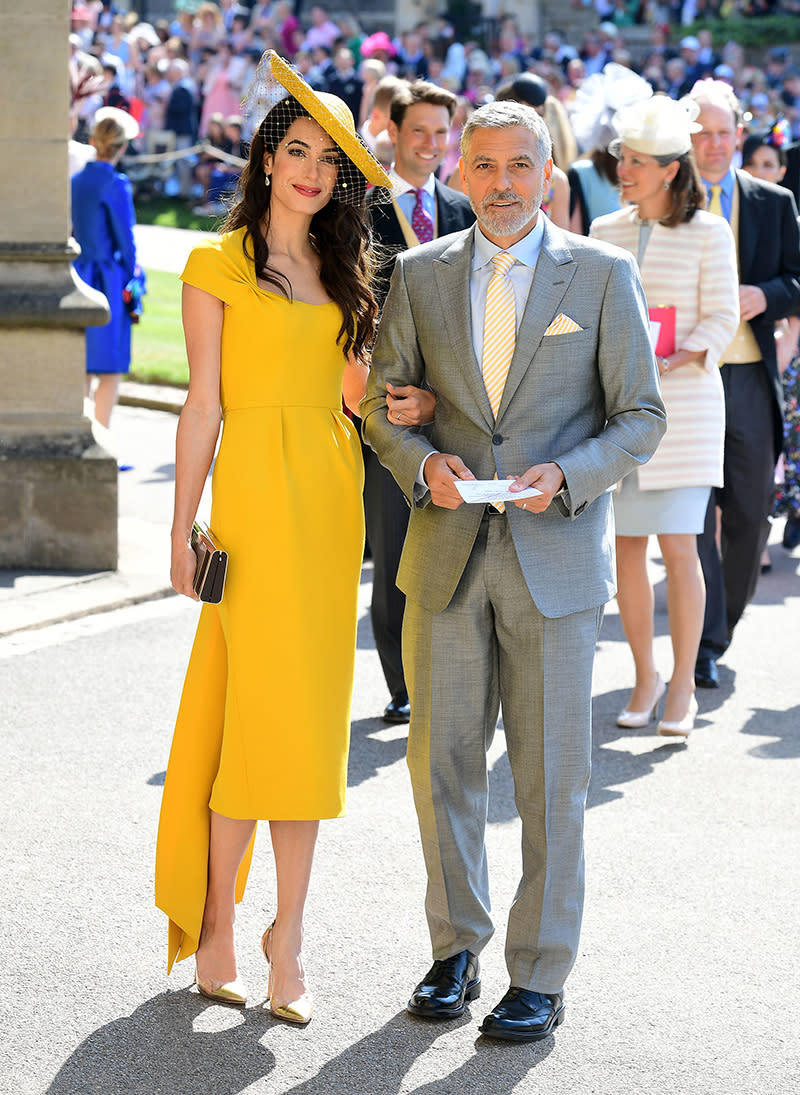 WINDSOR, UNITED KINGDOM - MAY 19: Amal and George Clooney arrive at St George's Chapel at Windsor Castle before the wedding of Prince Harry to Meghan Markle on May 19, 2018 in Windsor, England. (Photo by Ian West - WPA Pool/Getty Images)