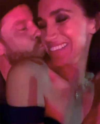 Meghan, Duchess of Sussex/Instagram Prince Harry kisses Meghan Markle at the Beyoncé concert
