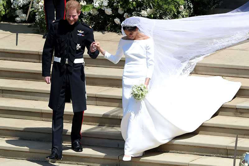 WINDSOR, UNITED KINGDOM - MAY 19: Prince Harry, Duke of Sussex and Meghan, Duchess of Sussex leave St George's Chapel, Windsor Castle after their wedding ceremony on May 19, 2018 in Windsor, England. (Photo by Andrew Matthews - WPA Pool/Getty Images)