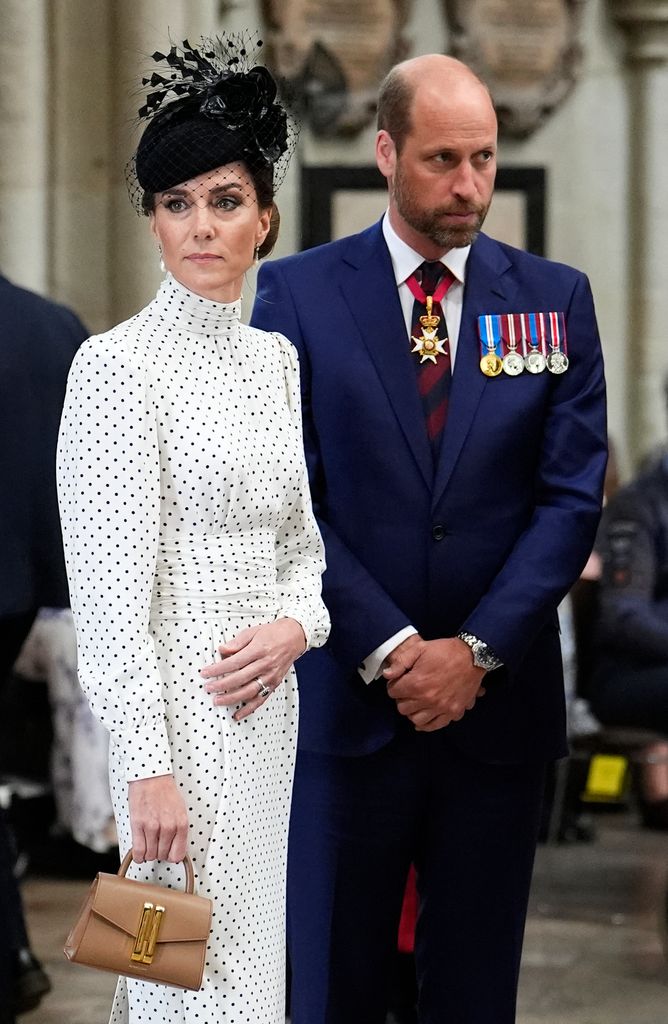 Princess Kate and Prince William standing side by side after walking through entrance of Westminster Abbey