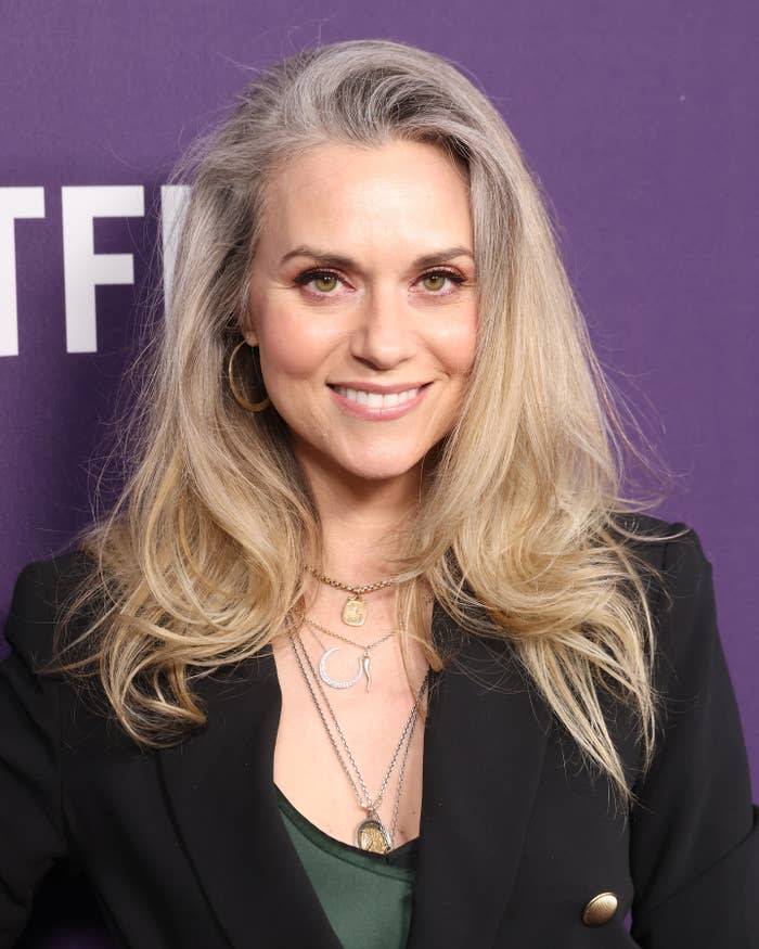 Hilarie Burton smiling at an event