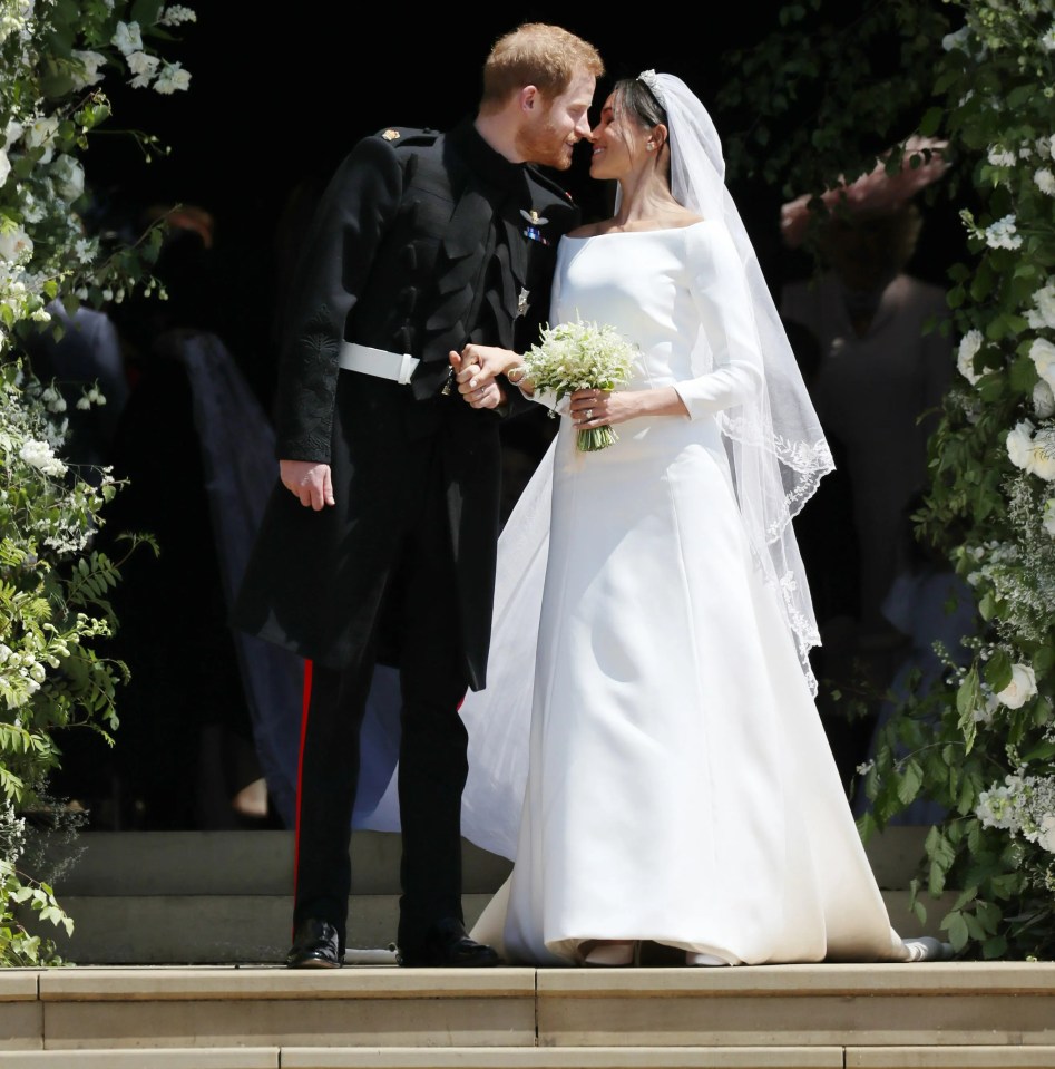 Prince Harry and Meghan Markle kissing after their wedding.
