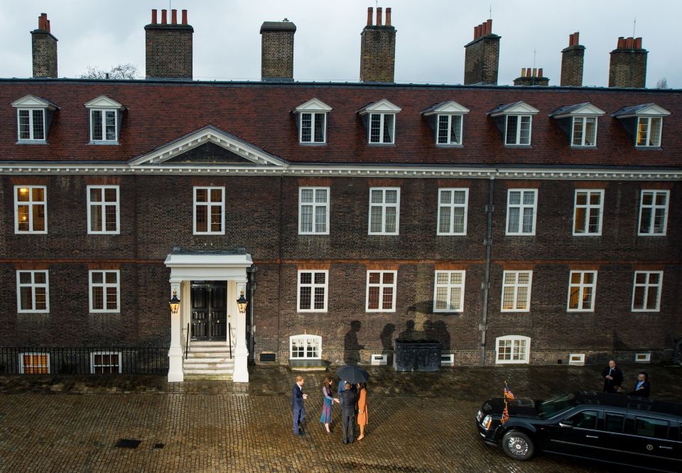 The Obamas are greeted by Prince Harry and the Duke and Duchess of Cambridge at Kensington Palace.