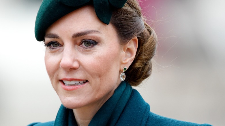 Kate Middleton smiling in emerald green