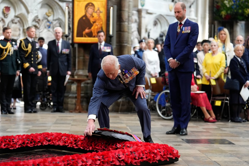 King Charles III laying a wreath at the Tomb of the Unknown Warrior.