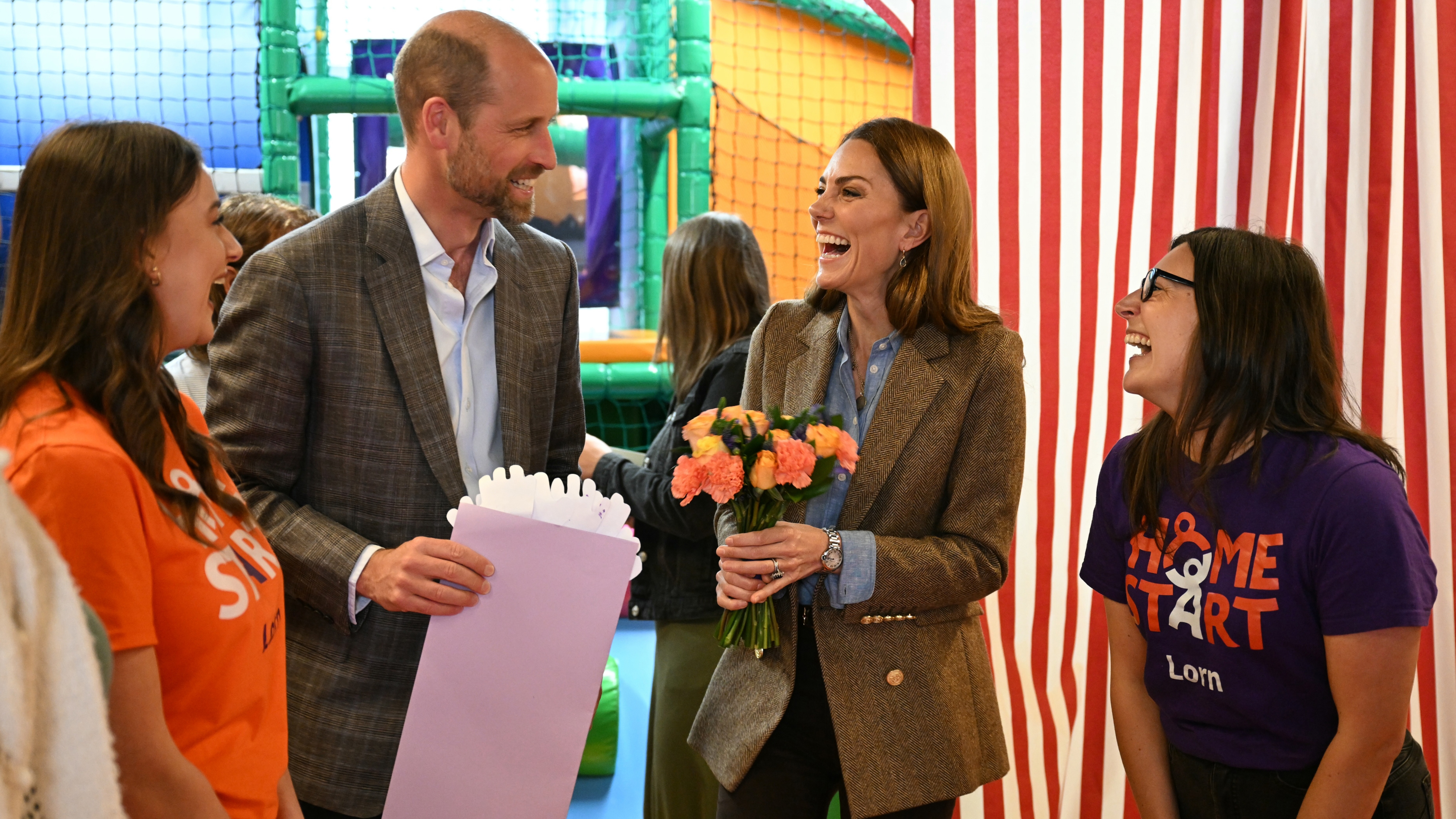 Prince William, Prince of Wales and Catherine, Princess of Wales react during a visit to a soft play area at Aros Hall, a local community hub on April 29, 2025