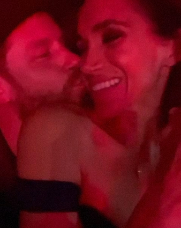 Prince Harry and Meghan sharing a close moment with hidden symbols on his cowboy hat sparking buzz at Beyoncé show.