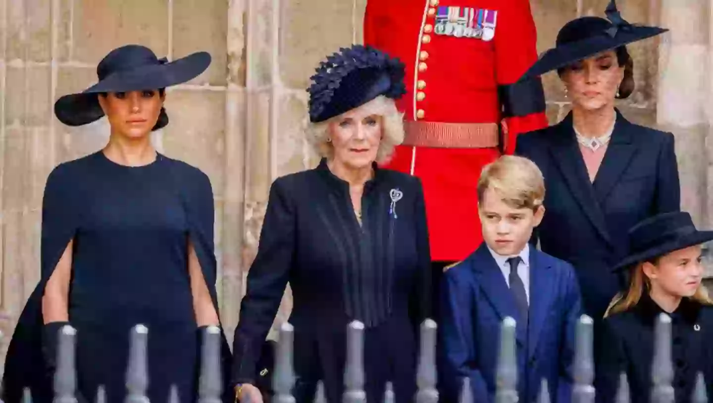 From left to right: Meghan Markle, Queen Camilla, Kate Middleton, Prince George, and Princess Charlotte (Patrick van Katwijk/Getty Images)