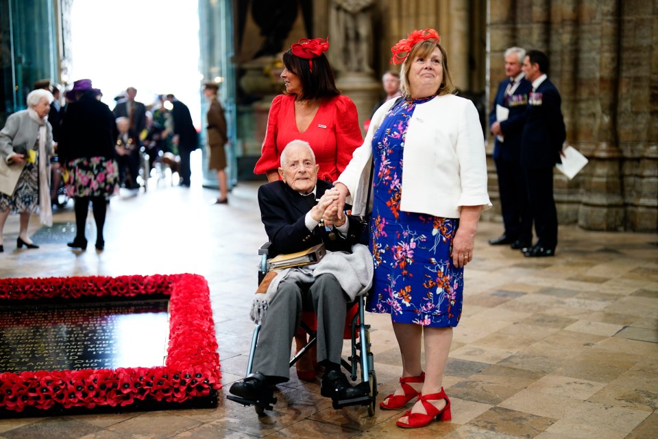 World War II veteran in wheelchair at Westminster Abbey service.