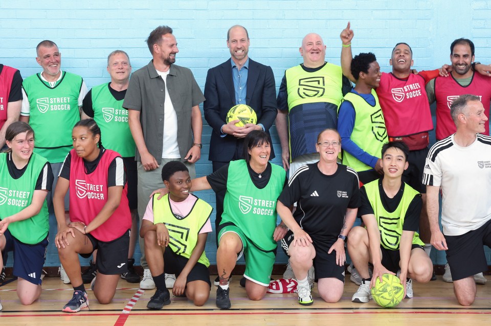 Prince William with Street Soccer Scotland founder and players.