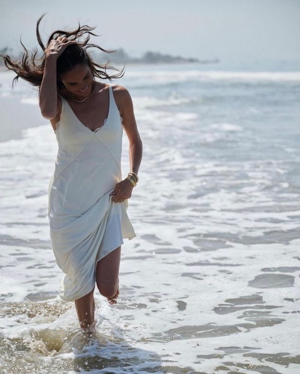Meghan wearing a casual white dress in the latest As Ever Instagram post