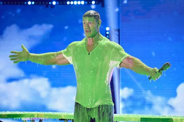John Cena speaks onstage at Nickelodeon's 2018 Kids' Choice Awards at The Forum on March 24, 2018 in Inglewood, California