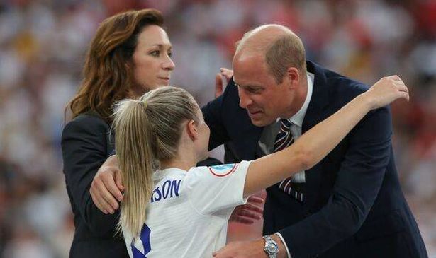Prince William hugging player