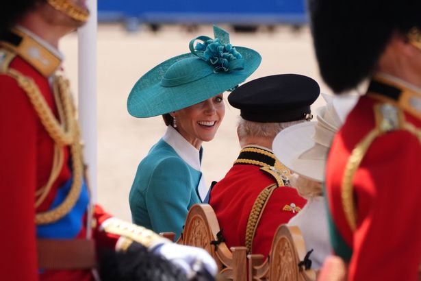 Kate watches the military parade alongside King Charles 