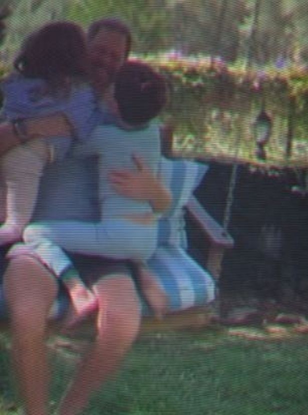 Harry is hugged by his children 