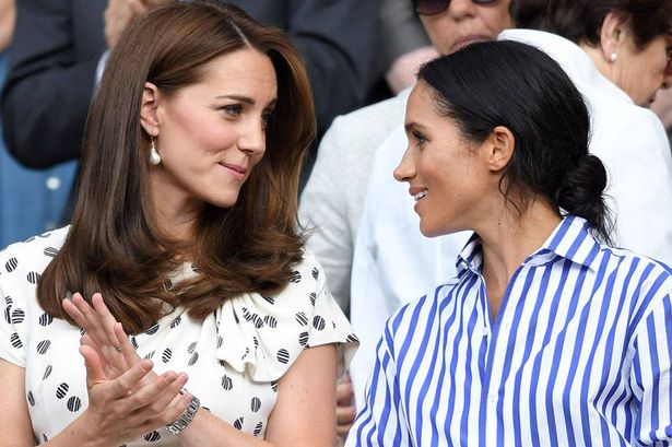 Kate and Meghan chatting amicably at Wimbledon in 2019