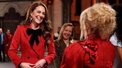 Kate Middleton steps out in her scarlet princess look for the Christmas carol service