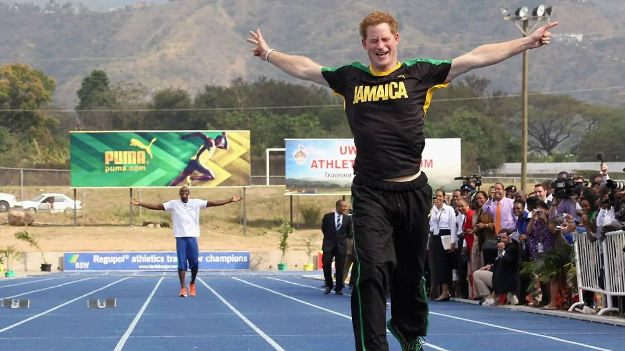Prince Harry races Usain Bolt at the University of West Indies' Mona campus. | Chris Jackson/Getty Images via Daily Mail Prince Harry races Usain Bolt at the University of West Indies' Mona campus. | Chris Jackson/Getty Images via Daily Mail