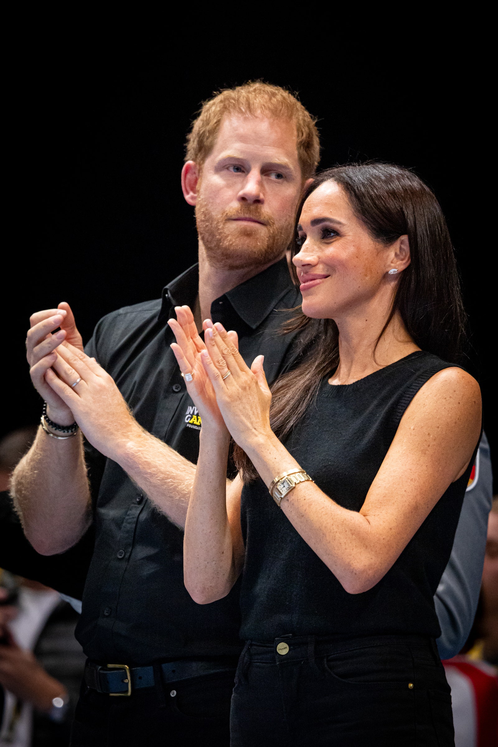 Image may contain Prince Harry Duke of Sussex Meghan Duchess of Sussex Accessories Jewelry Ring Wristwatch and Adult