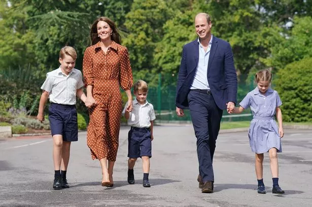 Prince George, Princess Charlotte and Prince Louis (C), accompanied by their parents the Prince William, Duke of Cambridge and Catherine, Duchess of Cambridge