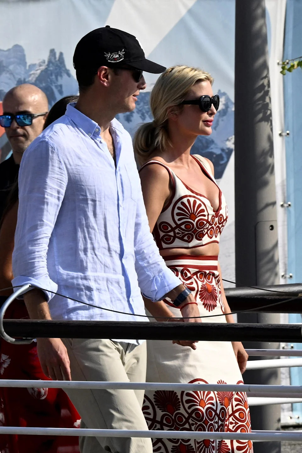 Ivanka Trump was one of the early arrivals in Venice alongside her husband, Jared Kushner. The daughter of Donald Trump wore a white tank top and skirt set, with a red floral pattern. She completed the look with black sunglasses (AFP via Getty Images)