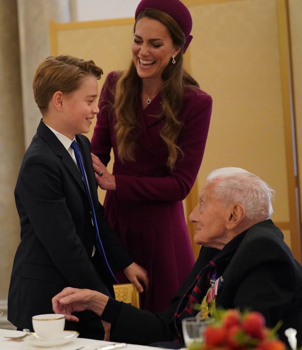 George laughs with mum Kate 