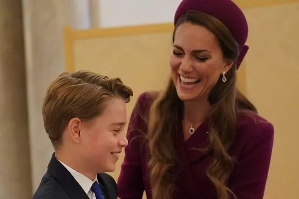 George laughs with mum Kate 
