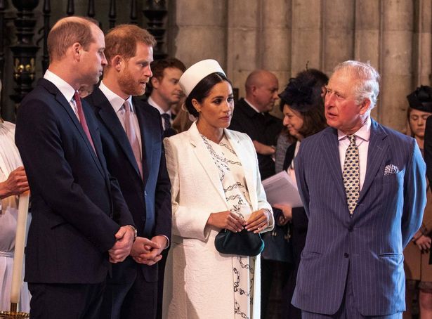 Meghan, Duchess of Sussex talks with Britain's Prince Charles, Prince of Wales as Britain's Prince William, Duke of Cambridge, talks with Britain's Prince Harry, Duke of Sussex