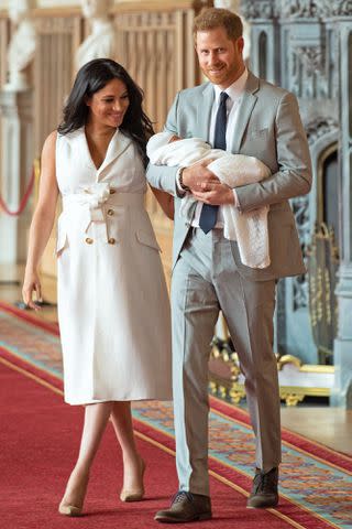 Dominic Lipinski - WPA Pool/Getty Meghan Markle, Prince Archie and Prince Harry during a photo call at St. George's Hall at Windsor Castle on May 8, 2019.