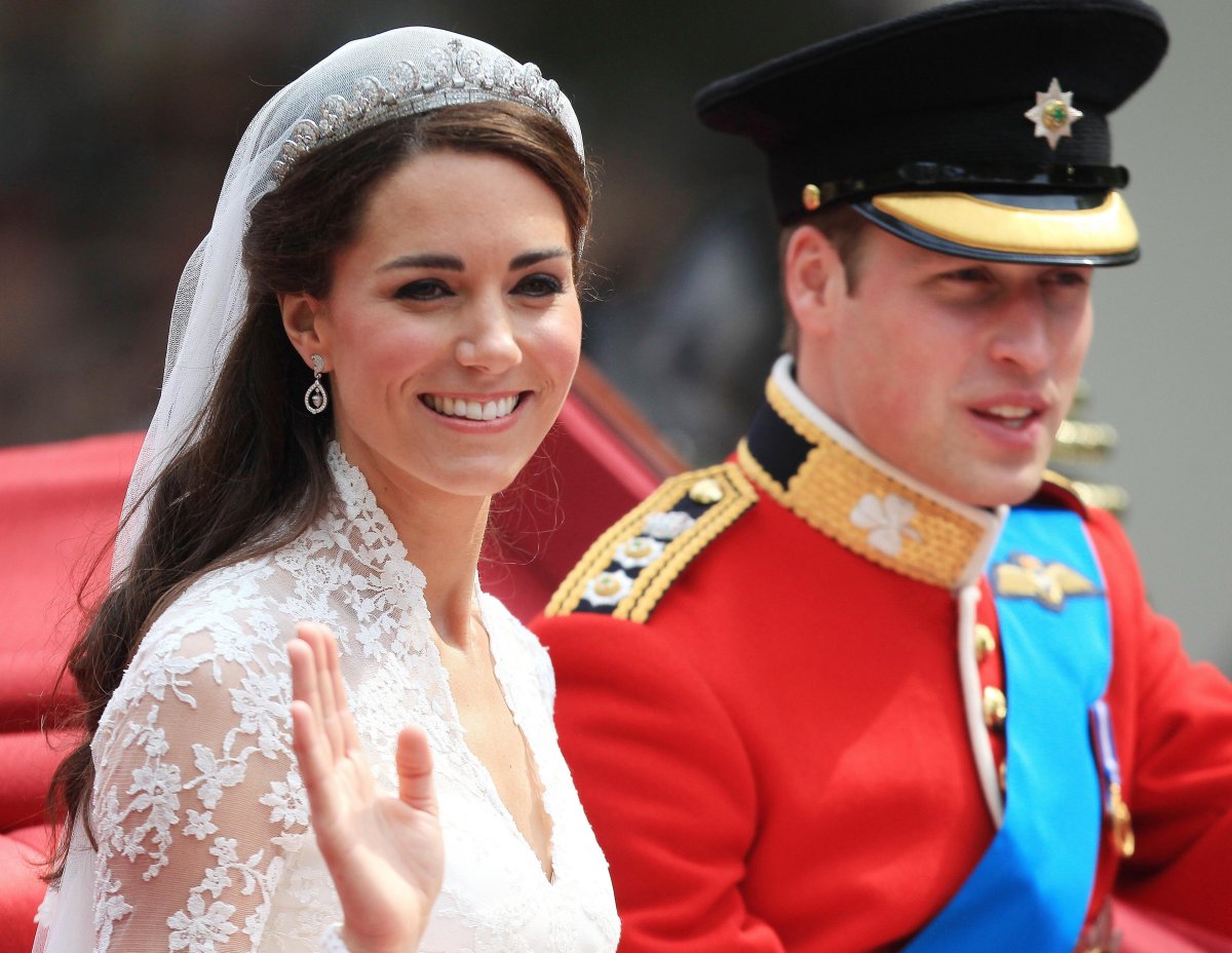 The Duke and Duchess of Cambridge travel from Westminster Abbey to Buckingham Palace after their royal wedding on April 29, 2011 (Mike Egerton/PA Images/Alamy)