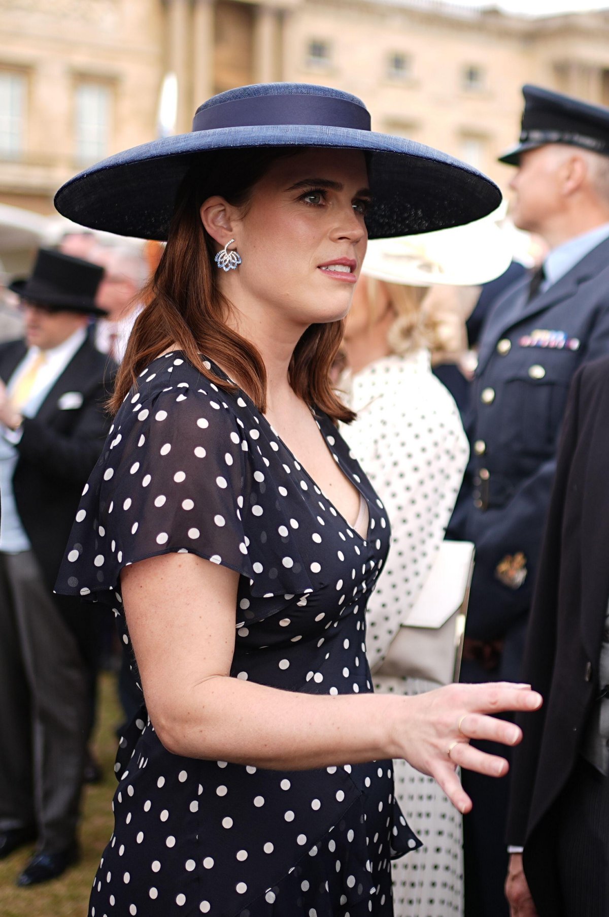 Princess Eugenie attends a garden party at Buckingham Palace in London on May 20, 2025 (Aaron Chown/PA Images/Alamy)